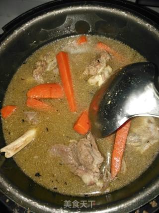 新疆羊肉抓饭的做法步骤：12