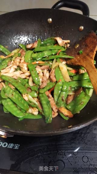 干尤炒荷兰豆的做法步骤：7