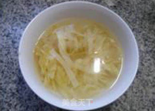 咸肉千张炒圆白菜的做法步骤：6