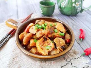 酸菜油豆腐烧肥肠的做法步骤：12