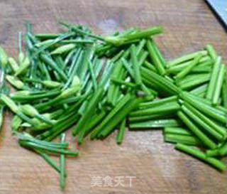 韭菜花香干炒鱿鱼的做法步骤：6