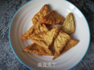 炸豆腐炒蒜苔的做法步骤：1