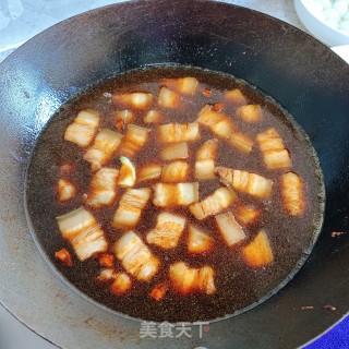 鹌鹑蛋红烧肉的做法步骤：7