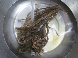 梅干菜炒花蛤的做法步骤：2