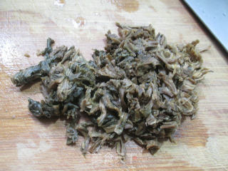 梅干菜炒花蛤的做法步骤：3