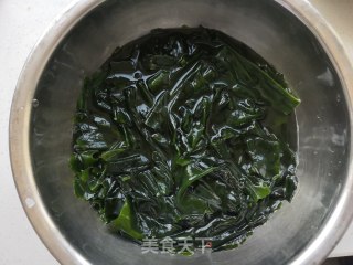 裙带菜豆腐香菇炖鱼尾的做法步骤：7