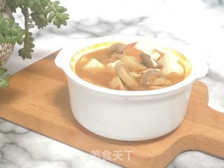 白蘑菇豆腐汤的做法步骤：7