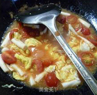 圣女果海鲜菇炒鸡蛋的做法步骤：14