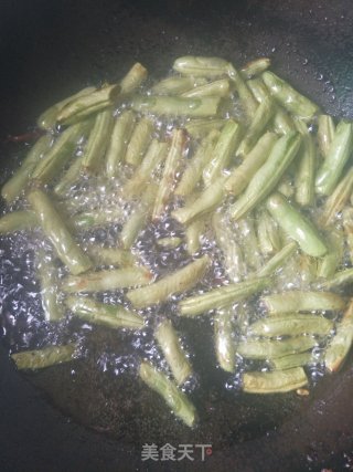 干煸四季豆的做法步骤：5