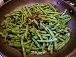 豆豉鲮鱼炒四季豆的做法步骤：5