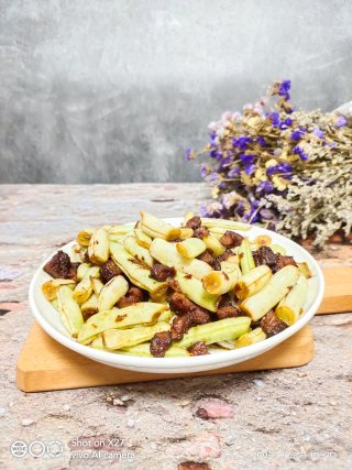 牛肉丁炒不老豆的做法步骤：7