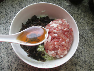 黑木耳夜开花肉馅饺子的做法步骤：5