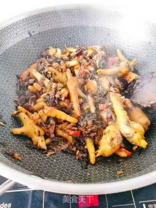 梅干菜烧鸡爪的做法步骤：15