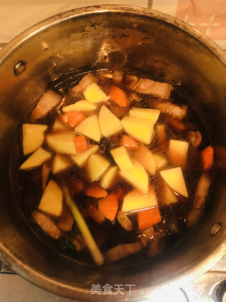 土豆红烧肉的做法步骤：9