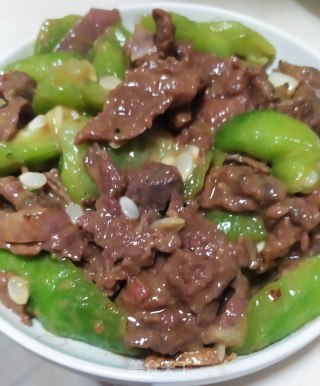 牛肉炒丝瓜的做法步骤：7