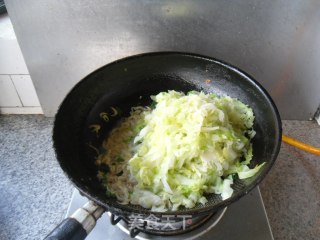 圆白菜炒豆腐干的做法步骤：7