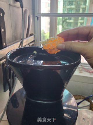 鲜榨柑橘汁的做法步骤：3