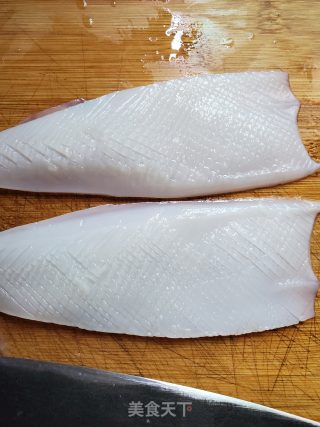 鱿鱼炒甜豆的做法步骤：3