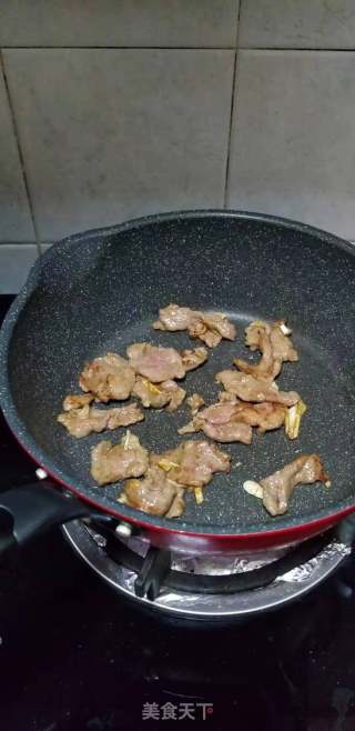 平菇炒肉片的做法步骤：7