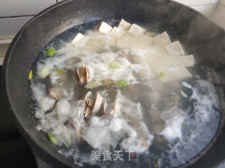 小白菜蚶子豆腐汤的做法步骤：11