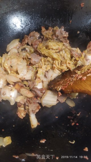 羊肉炒酸菜的做法步骤：7