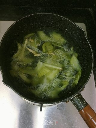 咸菜花蛤汤的做法步骤：7