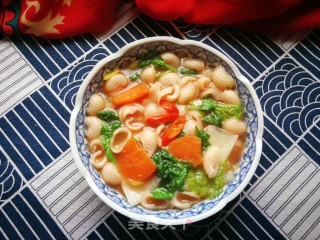 胡萝卜红菇鸡汤煮猫耳朵的做法步骤：11