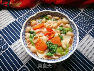 胡萝卜红菇鸡汤煮猫耳朵的做法步骤：13