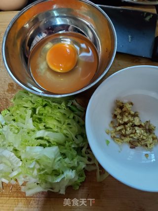 风姜鸡蛋粥的做法步骤：2
