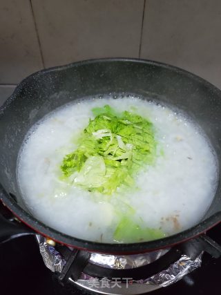 风姜鸡蛋粥的做法步骤：4