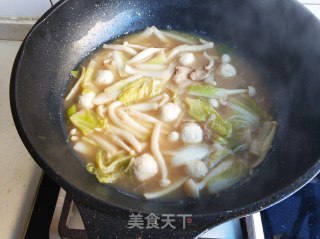 娃娃菜海鲜菇丸子汤的做法步骤：14