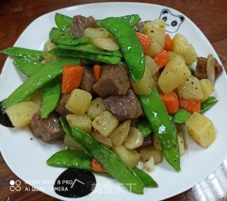 土豆荷兰豆炒牛肉粒的做法步骤：9