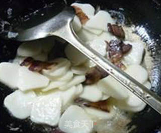 韭菜腊肉炒年糕的做法步骤：9