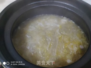 冬日暖汤  猪骨头炖酸菜的做法步骤：9