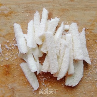 煎馒头条的做法步骤：2