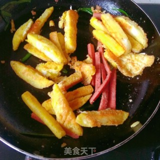煎馒头条的做法步骤：7