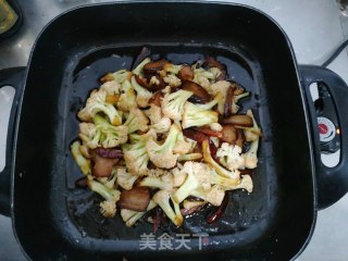 干煸腊肉菜花的做法步骤：7