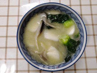 白菜菌菇煮年糕的做法步骤：10