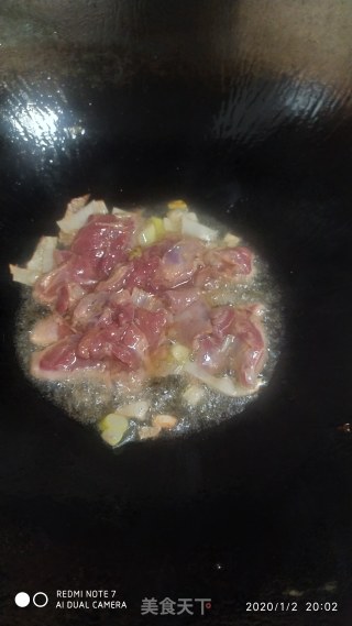 鸭肉炒花菜的做法步骤：5