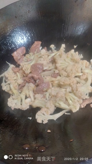 鸭肉炒花菜的做法步骤：7