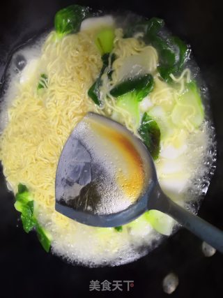 煮年糕面条的做法步骤：7