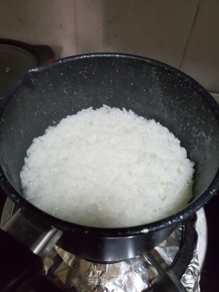腊肠煲仔饭的做法步骤：7