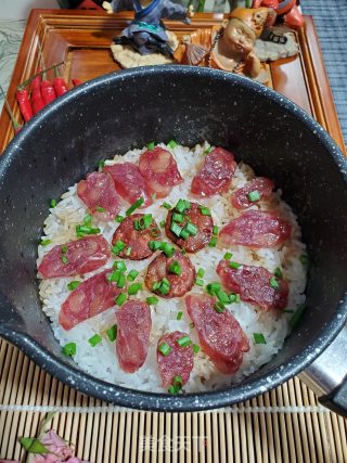 腊肠煲仔饭的做法步骤：15