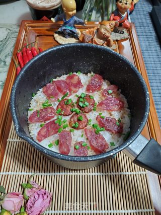 腊肠煲仔饭的做法步骤：17