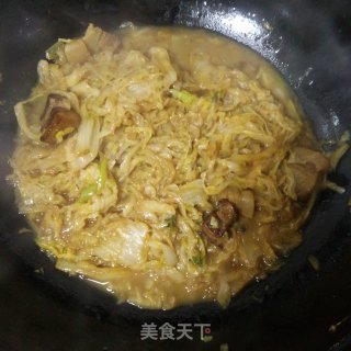 红焖肉炖酸菜的做法步骤：9