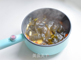 海带炖鱼的做法步骤：7