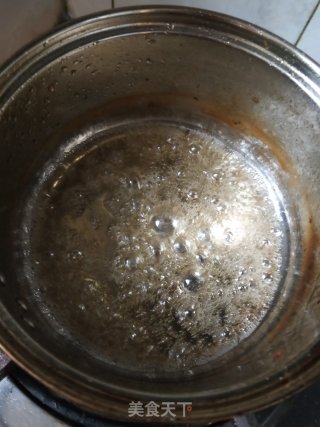 糖霜花生的做法步骤：1