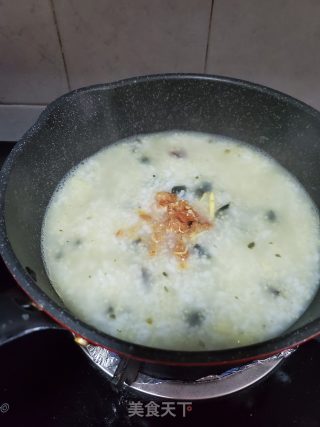 皮蛋瘦肉二米粥的做法步骤：4
