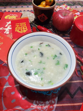 皮蛋瘦肉二米粥的做法步骤：7
