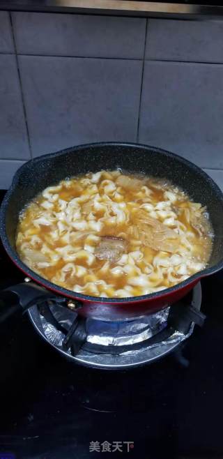 辣白菜五花肉汤面的做法步骤：7